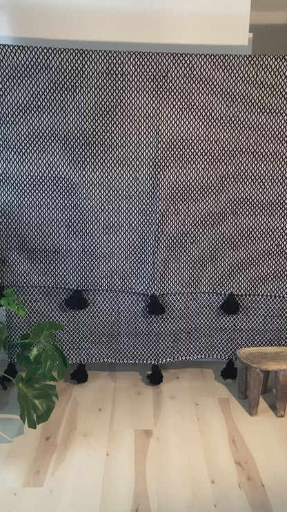 Knitted Wool Blanket with Black pompoms